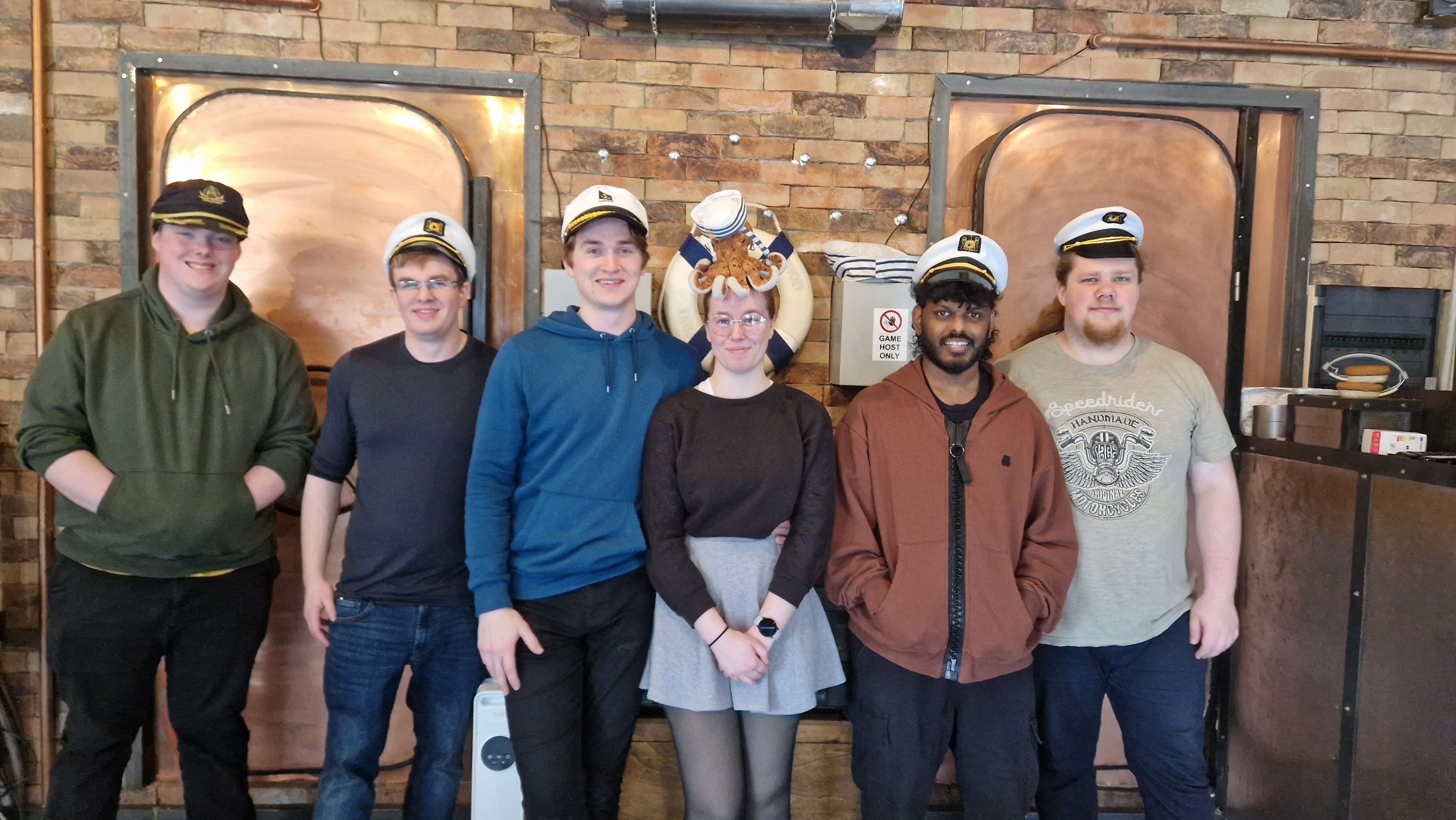 students in sailing hats